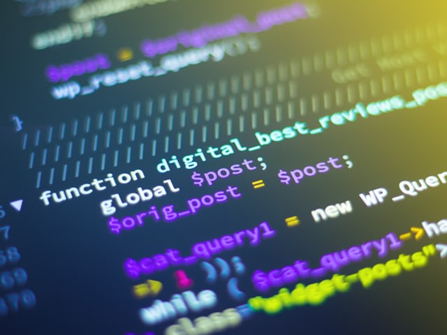 Website code and markup displayed on a screen