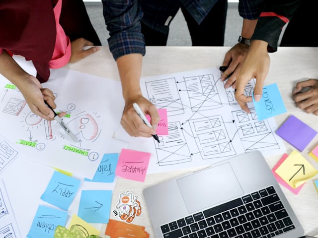 Top-down view of website structure sketches and planning notes